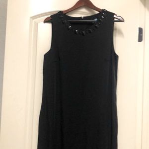 Black cocktail dress with gemstone collar